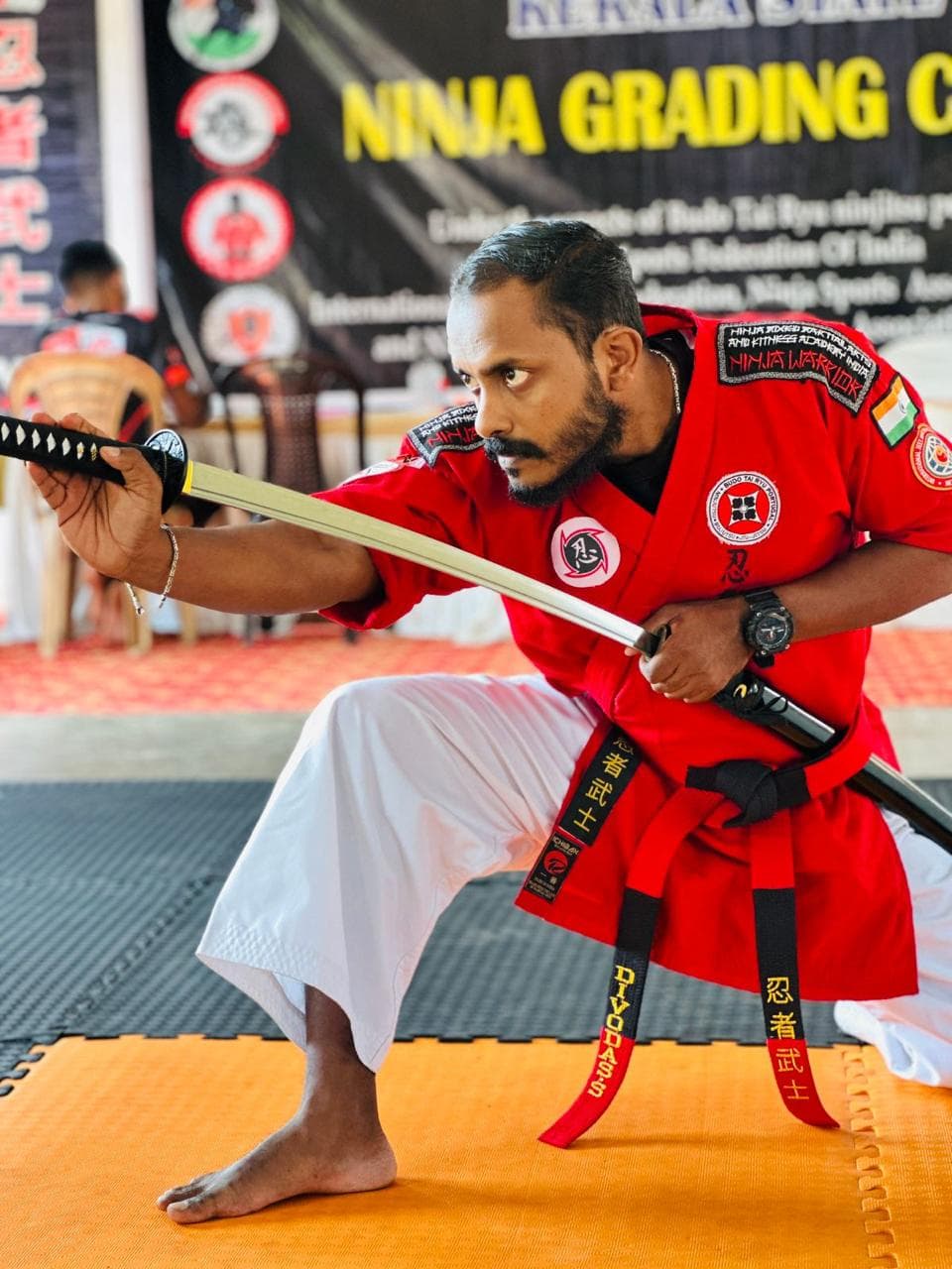 Master Divo Das in action stance at grading camp