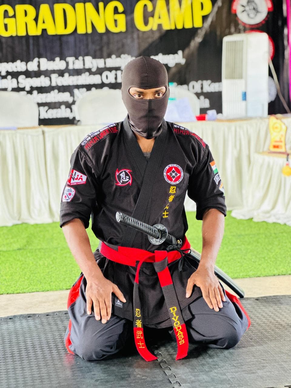 Master Divo Das in full ninja outfit at grading camp
